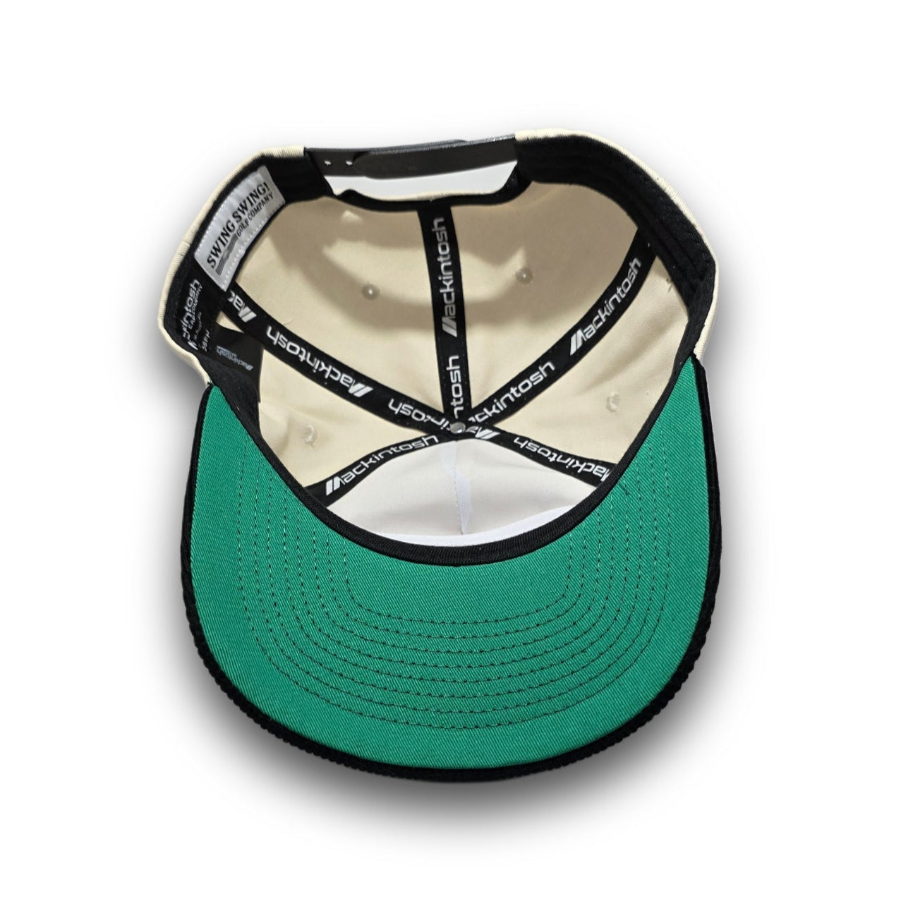 Kelly green undervisor on beige and black Swing Hard vintage golf hat