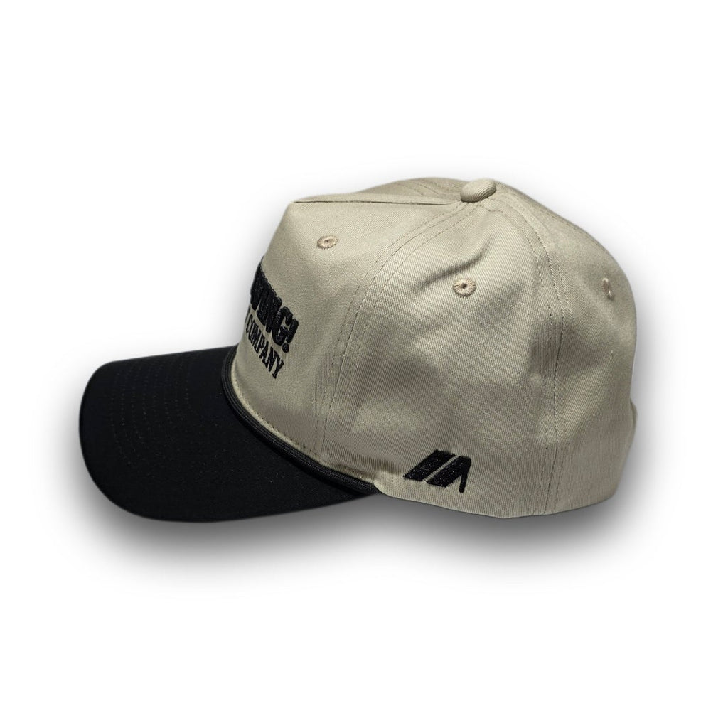 Side profile of beige and black Script Logo golf hat with corduroy visor