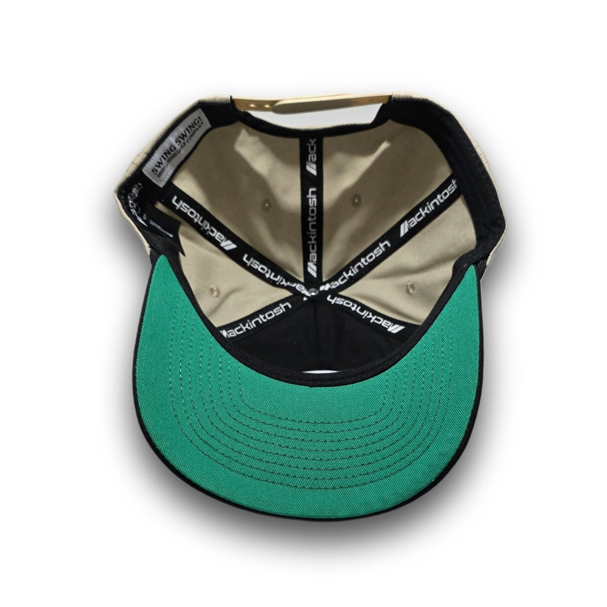 Kelly green undervisor on beige and black Script Logo vintage golf hat