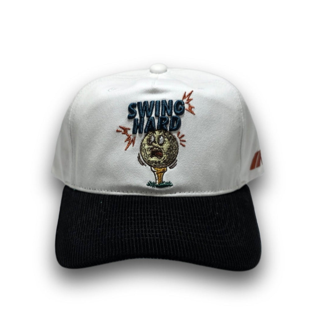 Front view of white and black Swing Hard golf hat