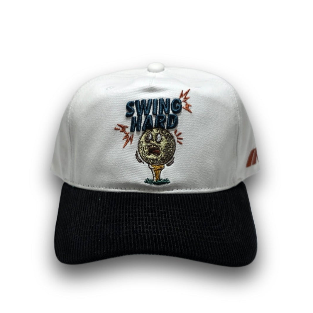Front view of white and black Swing Hard golf hat